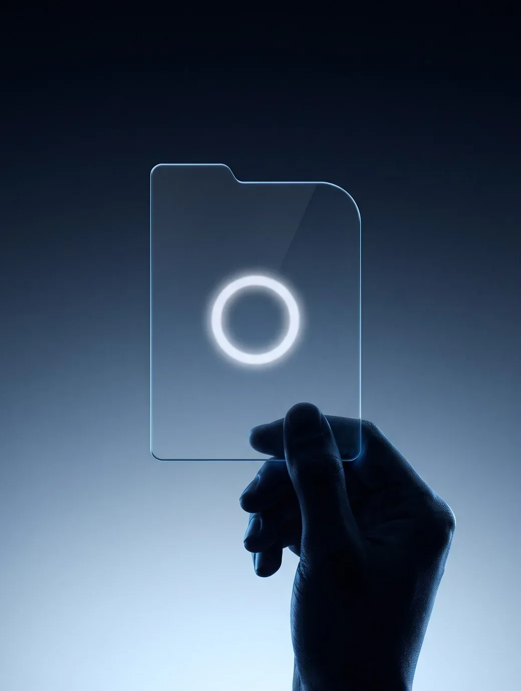 A hand holding a frosted glass file in blue light